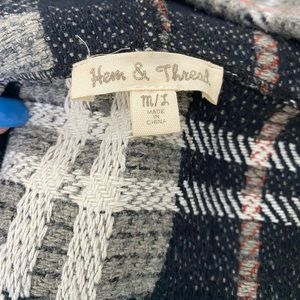 Thick knit vest, perfect for layering. Only been worn twice